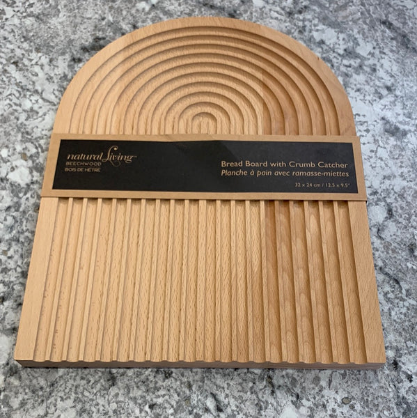 Breadboard with crumb catcher
