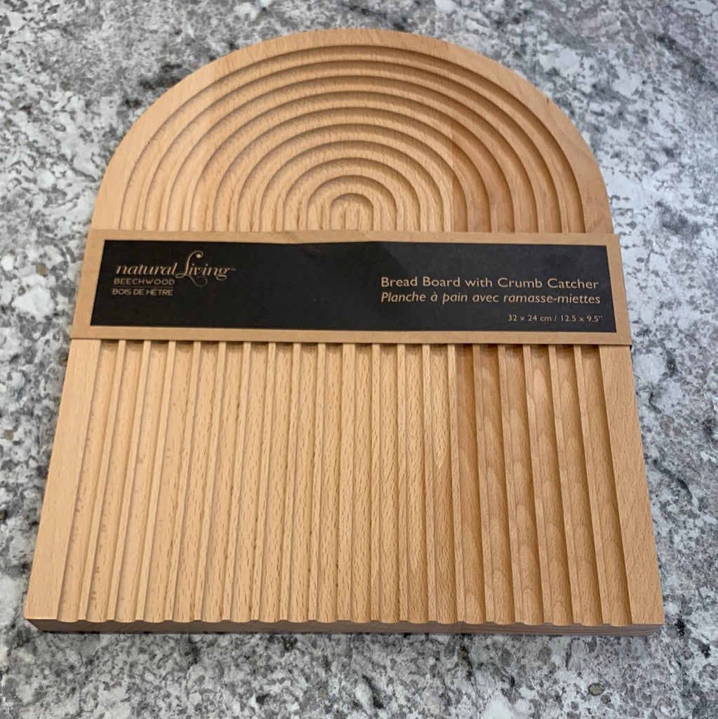 Breadboard with crumb catcher